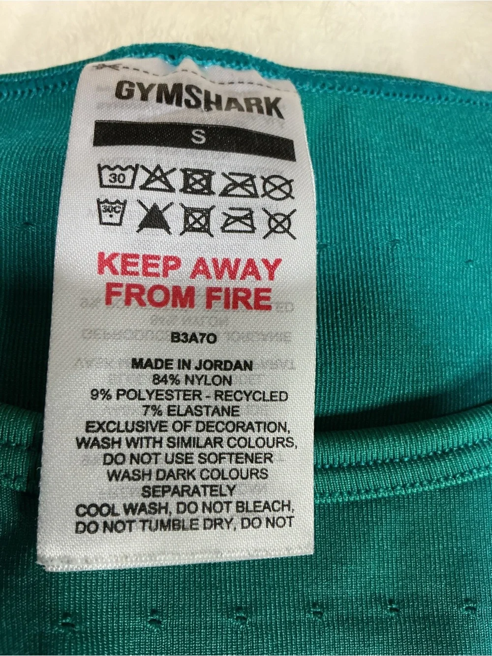 Gymshark seamless crop with back cut out teal green size small